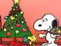 Lojë Snoopy Puzzle për Krishtlindje në internet Lojë Snoopy Puzzle për Krishtlindje në internet